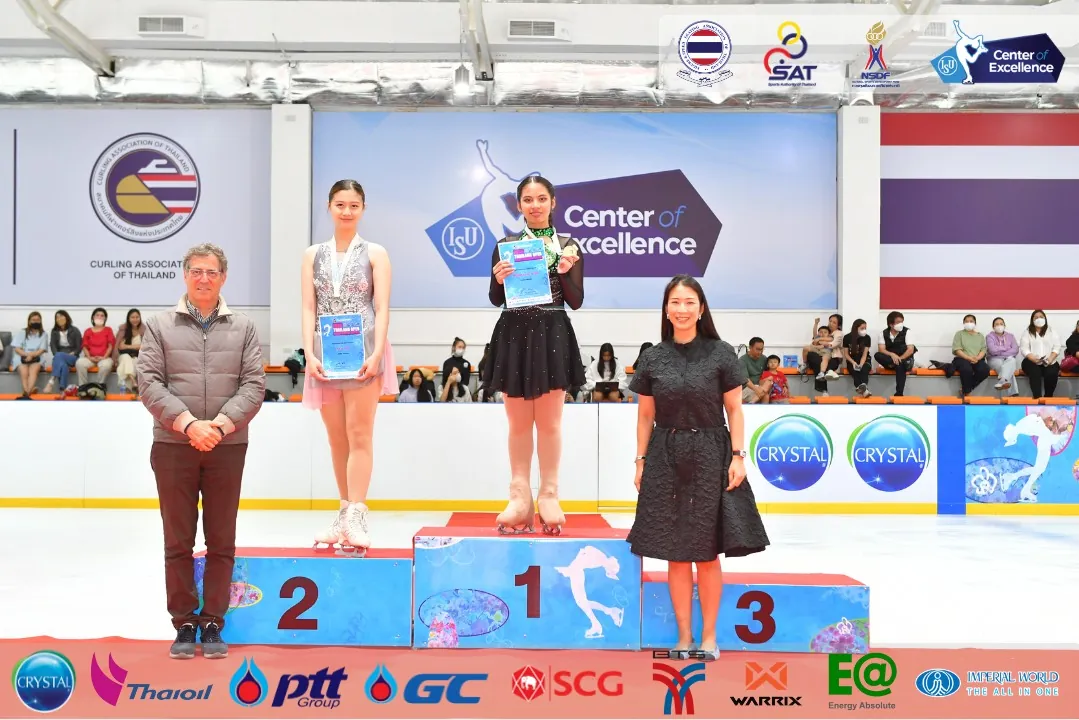 The award ceremony for two Thai women figure skaters.